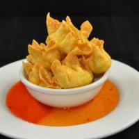 Crab Ranggoon: · Golden-fried wonton skin wrapped w/crab meat, basil leaves, & cream cheese, served w/spicy h...