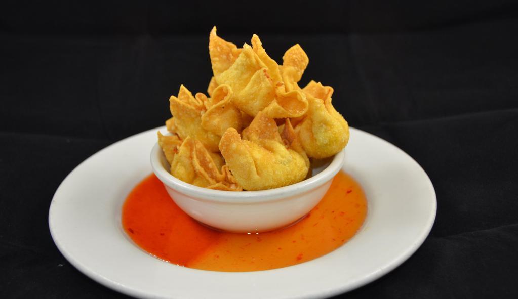 Crab Ranggoon: · Golden-fried wonton skin wrapped w/crab meat, basil leaves, & cream cheese, served w/spicy homemade sauce.