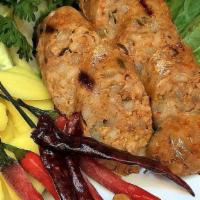 Chiang Mai Sausage* · Grilled Northern Thai spicy sausage, made with herbs, curry 
powder and aromatics served wit...