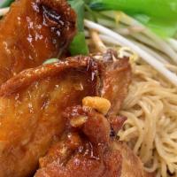 Peek Kai Noodle · Steamed egg noodle tossed our delicious spicy lime sauce  with signature fish sauce wings, b...