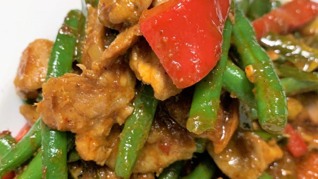 Pad Phrik Khing* · Famous Thai dish Pan Fried choice of protein with red curry paste, string bean and kaffir lime leave serve with Jasmine rice.