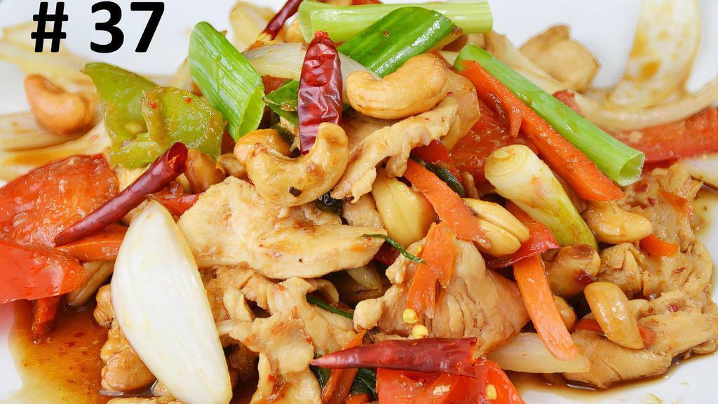 Cashew:* · Stir-fried choice of protein with chili paste, bell peppers, carrots, cashew nuts, onions, and green onions.