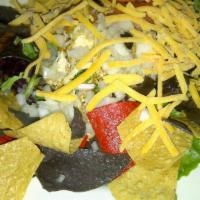 Taco Salad · Choice of shredded chicken or taco beef with romaine lettuce, onion, olives, tomato, cheddar...
