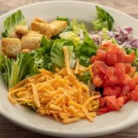 House Salad · House salad with mixed greens, tomato, red onion, cheddar cheese and croutons. Choice of dre...