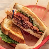 Classic Blt · Toasted bread topped with crispy bacon, crisp lettuce, tomato and mayo.