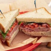 Deli Sandwich · Choice of turkey, ham, corned beef or tuna salad with choice of bread and cheese with lettuc...