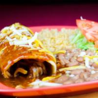 Carne Adovada Burro · Chunks of pork marinated in hatch red chile. Spicy New Mexican chile. Prepared enchilada sty...