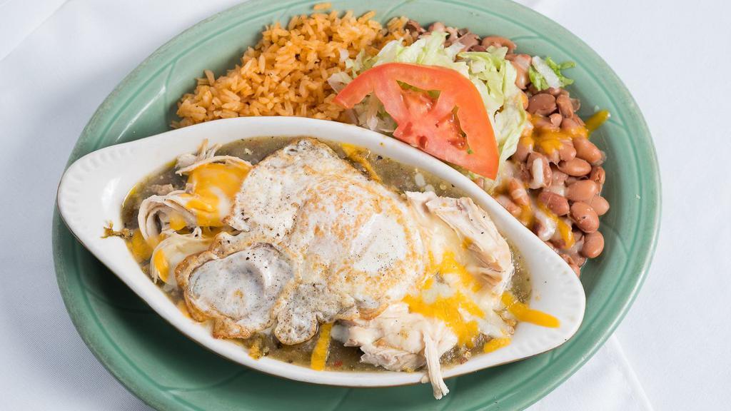  Casserole  · Shredded Tamale Base topped with either Adovada, or chicken, and red or green Chile. Egg on top and rice and beans on the side.