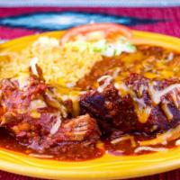Adovada Ribs · Boneless country style pork ribs marinated and served with New Mexican red chile, cheese, ch...