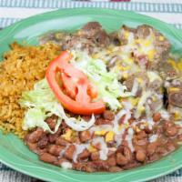 Carnitas · Pork slow cooked in a Dutch oven until tender and flavorful. Topped with cheese, served with...