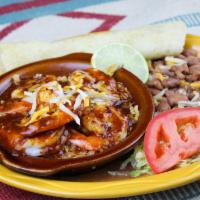 Shrimp Veracruz · Large shrimp in New Mexican red chile served over rice with a side of beans and a homemade f...