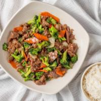 Beef And Broccoli · Sliced beef sautéed with onion and broccoli