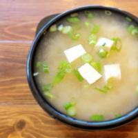 Miso Soup Cup · Traditional soothing broth with tofu and scallions.