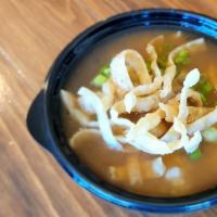 Tokyo Soup · Yoshi's most popular soup! Hot and sour broth with rice, avocado, cream cheese, chicken and ...