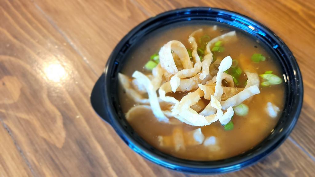 Tokyo Soup · Yoshi's most popular soup! Hot and sour broth with rice, avocado, cream cheese, chicken and wonton chips.
