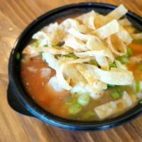 Firecracker Soup · Spicy hot-n-sour style broth with rice, scallions and wonton chips.