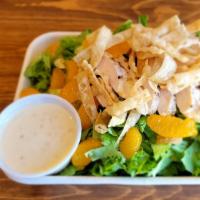 Sesame Ginger Salad · Our most popular salad! Green leaf lettuce with grilled chicken breast, toasted almonds, man...