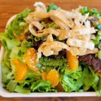 Asian Steak Salad · Green leaf lettuce with grilled steak, mandarin oranges, scallions, sesame seeds and wonton ...