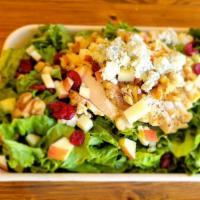 Cranberry Walnut Salad · Green leaf lettuce with grilled chicken breast, walnuts, craisins, honey crisp apples and bl...