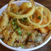 Tempura Chicken & Vegetables · Tempura chicken and tempura veggies served over rice paired with a side Yoshi's famous teriy...