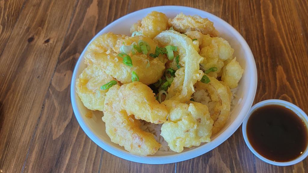 Tempura Shrimp & Vegetable · Tempura shrimp and tempura veggies served over rice paired with a side Yoshi's famous teriyaki sauce.