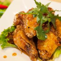 Cánh Gà Chiên Nước Mắm / Fish Sauce Chicken Wings · Deep fried wings with caramelized fish sauce or sweet chili sauce