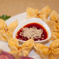 Crab Puff (6 Pc Per Order) · Crispy wontons wrapped with crab, imitation crab and cream cheese use with sweet chili sauce.