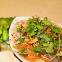 Goi Bò / Beef Salad · Mixing of beef, carrots, Chinese celery, daikon, onion, crushed roasted peanuts, fried shall...