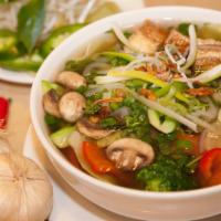 Phở Chay / Vegetarian Noodle Soup · Tofu, broccoli, carrot, mushroom, red pepper, cabbage with vegetarian noodle soup.