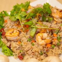 Cơm Chiên Đặc Biệt / Combination Fried Rice · Fried rice with bbq pork, shrimp, Vietnamese sausage, egg, pea and carrot.