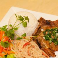 Cơm Sườn Nướng Tàu Hủ Ky · Grilled pork chop and bean curd skin with shrimp and jasmine rice.
