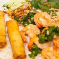 Bún Tôm Nướng Chả Giò · Grilled Shrimp and egg rolls served with vermicelli dish.