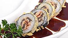 Eel Tempura Roll · 5pcs of cut fried roll seaweed rice avocado cream cheese sesame seeds eel sauce