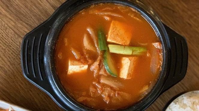 Kimchi Jijigae (Spicy Kimchi Stew) · Served with rice