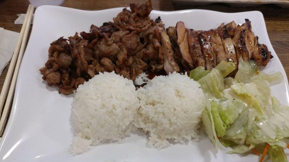Chicken & Pork · Served with rice and salad.