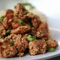 Fried Chicken · Choose from: sweet garlic sauce or spicy and tangy Korean sauce. Served with two scoops of r...