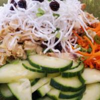 Curry-Peanut Chicken Salad · Shredded chicken with crispy rice noodle, raisin, curry-peanut dressing.