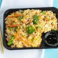 Chicken Fried Rice · Stir-fried rice with chicken + vegetables.