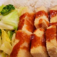 Tofu Teri Box · Fried tofu slices with white rice, drizzle of Joybox's teriyaki sauce + fresh salad.