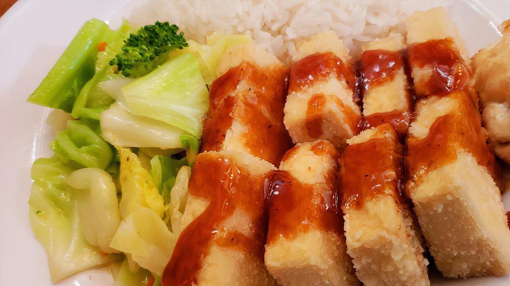 Tofu Teri Box · Fried tofu slices with white rice, drizzle of Joybox's teriyaki sauce + fresh salad.