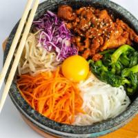 Bibimbap With Spicy Pork · Traditional Korean food. Includes spicy pork, white rice,  seasoned canola herbs, red cabbag...