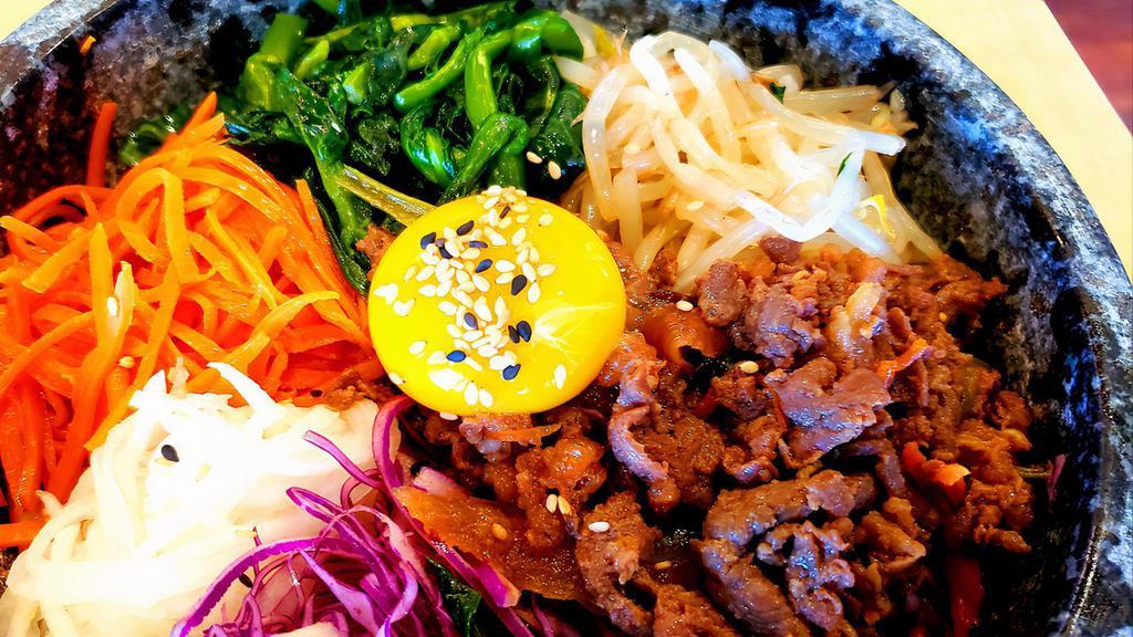 Bibimbap With Beef · Traditional Korean food. Includes beef, white rice,  seasoned canola herbs, red cabbage, beansprout, carrot, radish, egg,  and  Joybox's special hot sauce