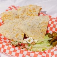 Quesadillas · One flour tortilla quesadilla with cheese inside and served with lettuce, pico de gallo, sou...