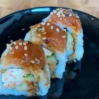 Red Dragon Roll · Shrimp tempura, spicy tuna, crab salad, cucumber, eel sauce.