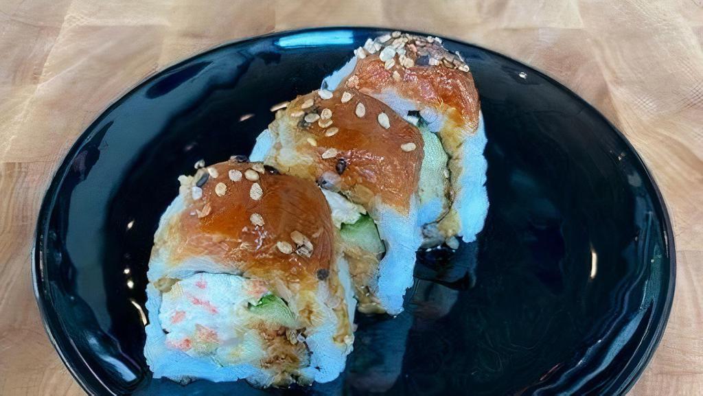 Red Dragon Roll · Shrimp tempura, spicy tuna, crab salad, cucumber, eel sauce.
