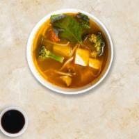 Soy Sea Tom Yum · Soy fish, soy shrimp, mushroom, tomato, onion, carrot, chili paste, and exotic herbs in hot ...