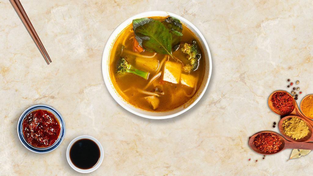 Soy Sea Tom Yum · Soy fish, soy shrimp, mushroom, tomato, onion, carrot, chili paste, and exotic herbs in hot and sour lemongrass broth.