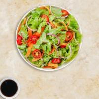 On The House Salad · Greens with choice of peanut, Italian, or tahini dressing.