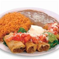 Taquitos Rancheros · Beef or chicken only. With guacamole, sour cream, rice and beans, cheese & tomato.