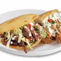 Gorditas (2) · Choice of meat, beans, onions, cilantro, salsa, lettuce, tomato, Mexican cream & Mexican che...